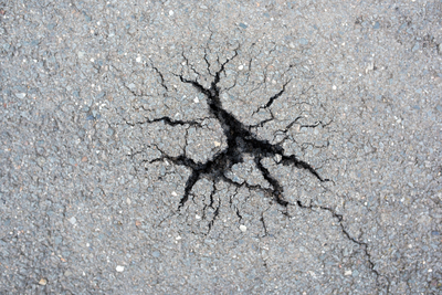Cracks in asphalt